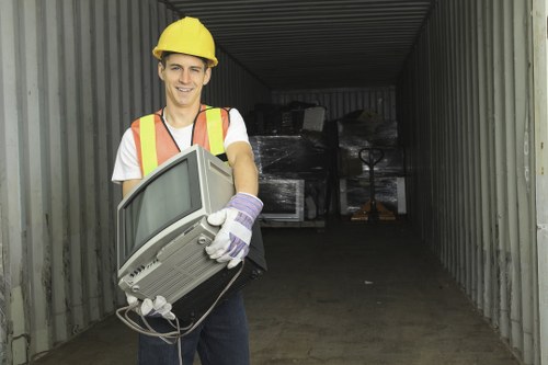 Team handling excessive items during loft clearance